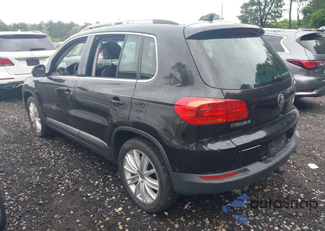 2014 Volkswagen Tiguan Sel z USA, uszkodzony, nr VIN WVGAV3AX3EW508496
